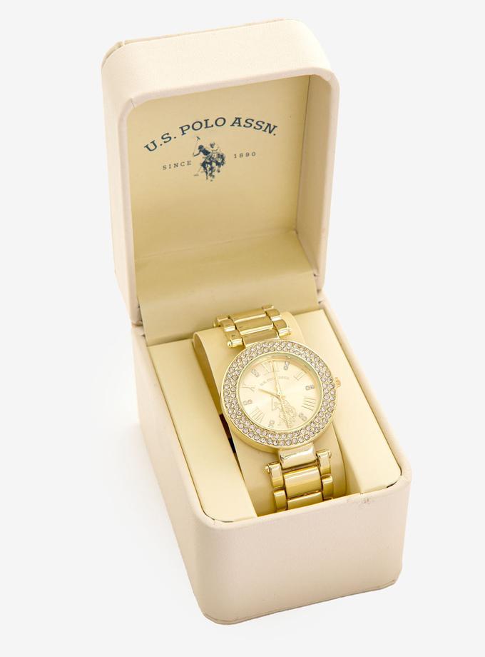 USPA LADIES GOLDTONE WATCH WITH CRYSTAL ENCRUSTED BEZEL On Sale